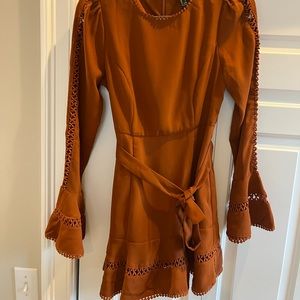 Burnt orange, beautifully detailed long sleeve dress with tie